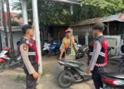 Personel Sat Samapta Polres Lombok Utara Laksanakan Patroli Dialogis Bersama Juru Parkir di Pasar Tanjung