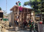 Babinsa dan Warga Desa Langko Bersatu dalam Pengecoran Rumah